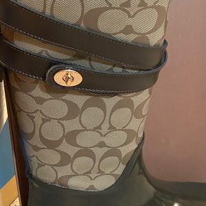 Coach rain boots gently warn.